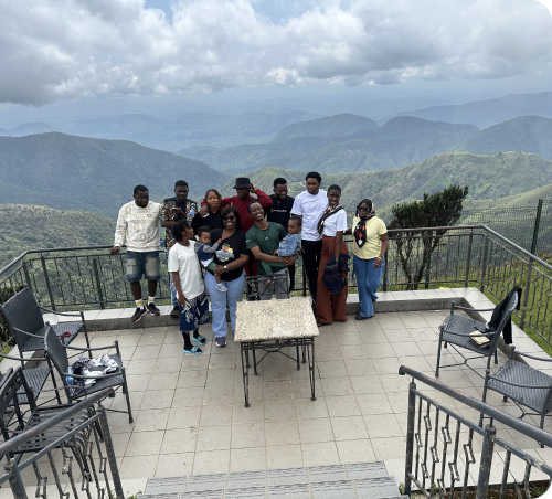 Group photo on a mountain balcony